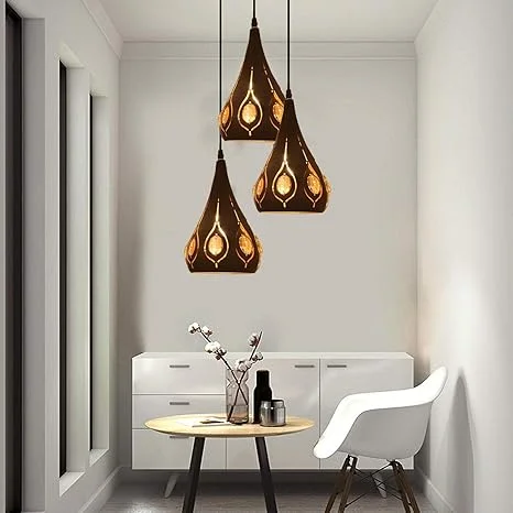 Matt black industrial cage pendant light with geometric wire design and E27 bulb, hanging from adjustable cable