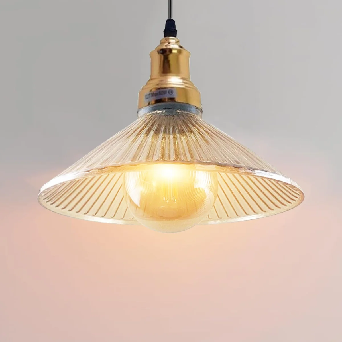 Vintage amber glass ceiling pendant light with cone-shaped shade in retro industrial style, 25cm height, 11cm width