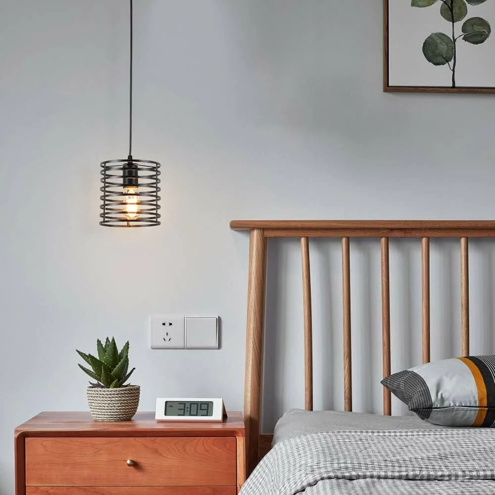 Black open metal cage light shade in a triangle shape with easy fit design for ceiling or wall mounting