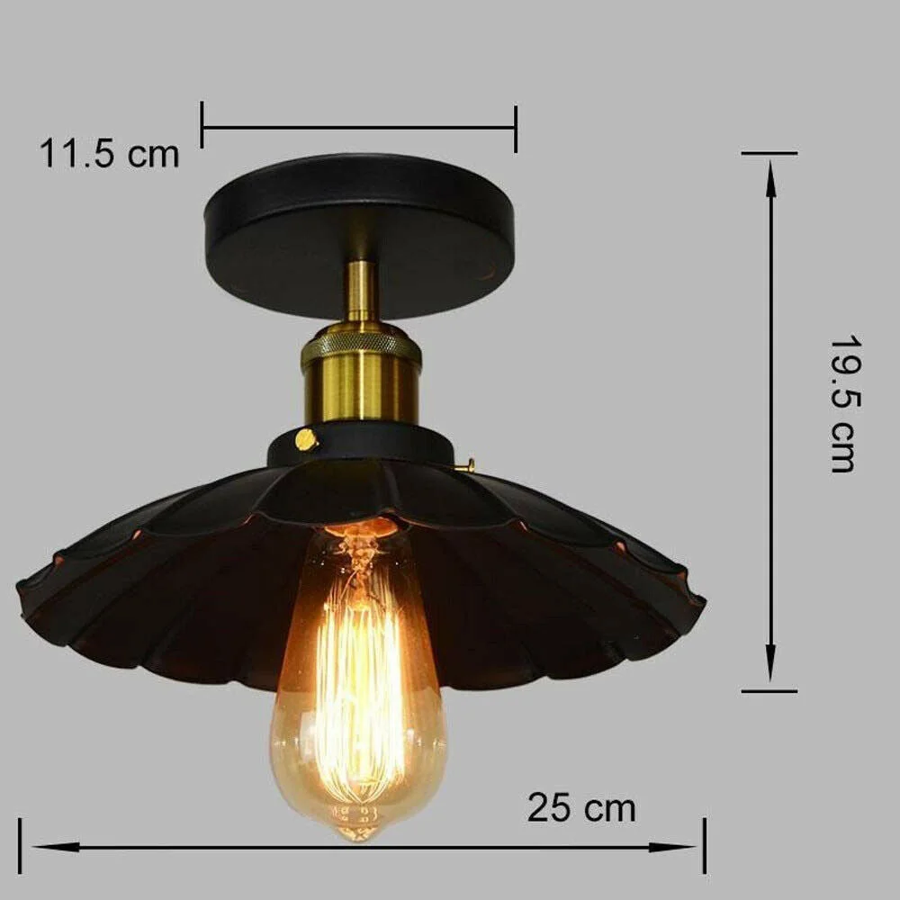 Black industrial ceiling light with a metal flush mount and clear hanging shade, suitable for indoor spaces and work lighting