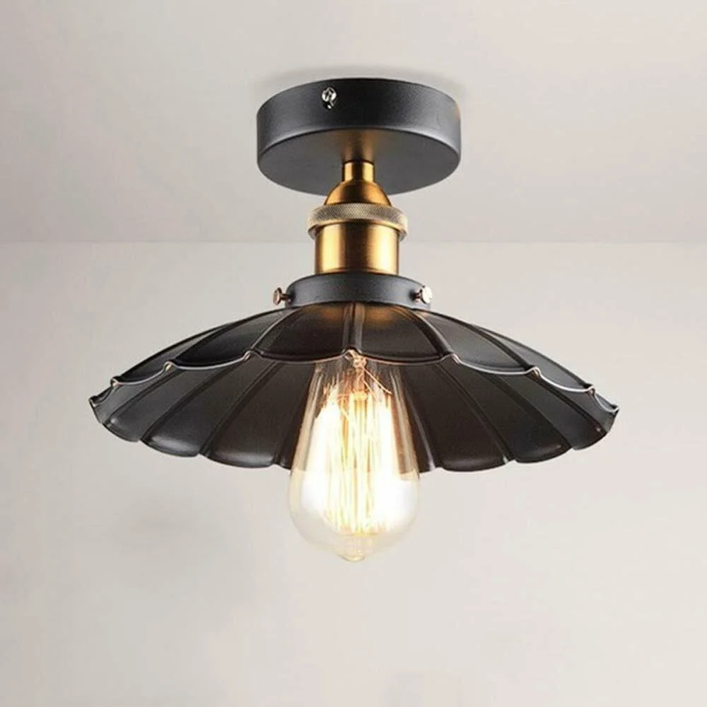 Black flush mount light with simple modern metal shade in black, designed for indoor ceiling installation with E27 bulb base