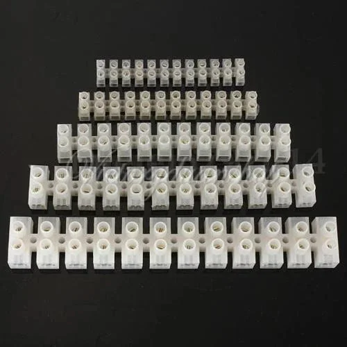 White 12 way vehicle wiring connector with two rows of screw terminals and triangular clamps for secure connections