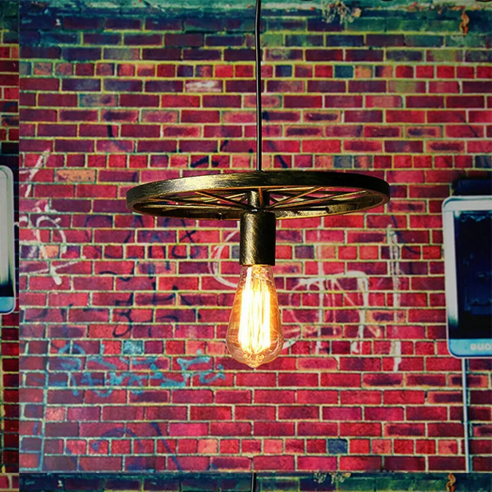 Brushed brass retro wheel pendant light with E27 base hanging from ceiling, industrial vintage style, 30cm diameter