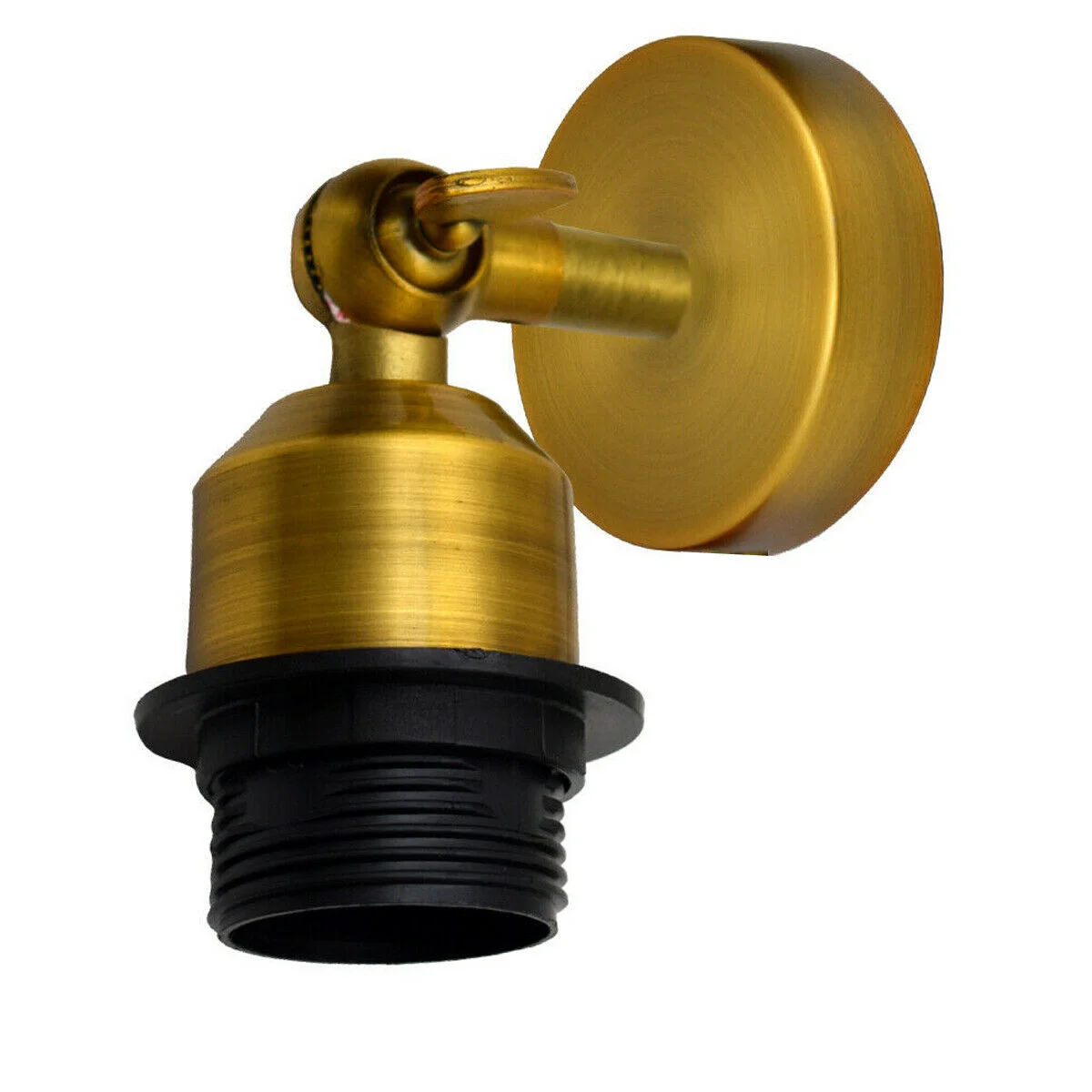 Industrial adjustable wall light in antique brass finish with pivoting arm and vintage metal shade mounted on wall
