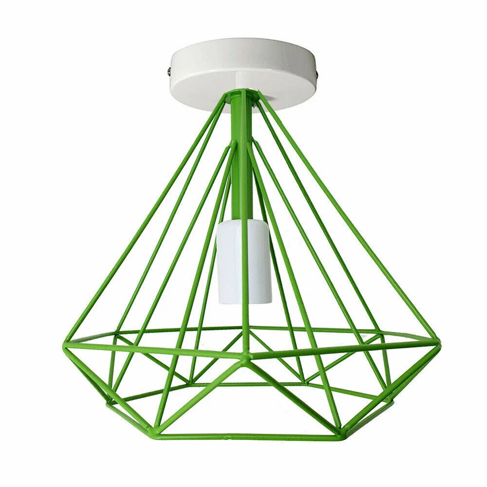 Modern geometric diamond cage semi-flush pendant light in gold metal with Edison-style bulb, casting ambient shadows