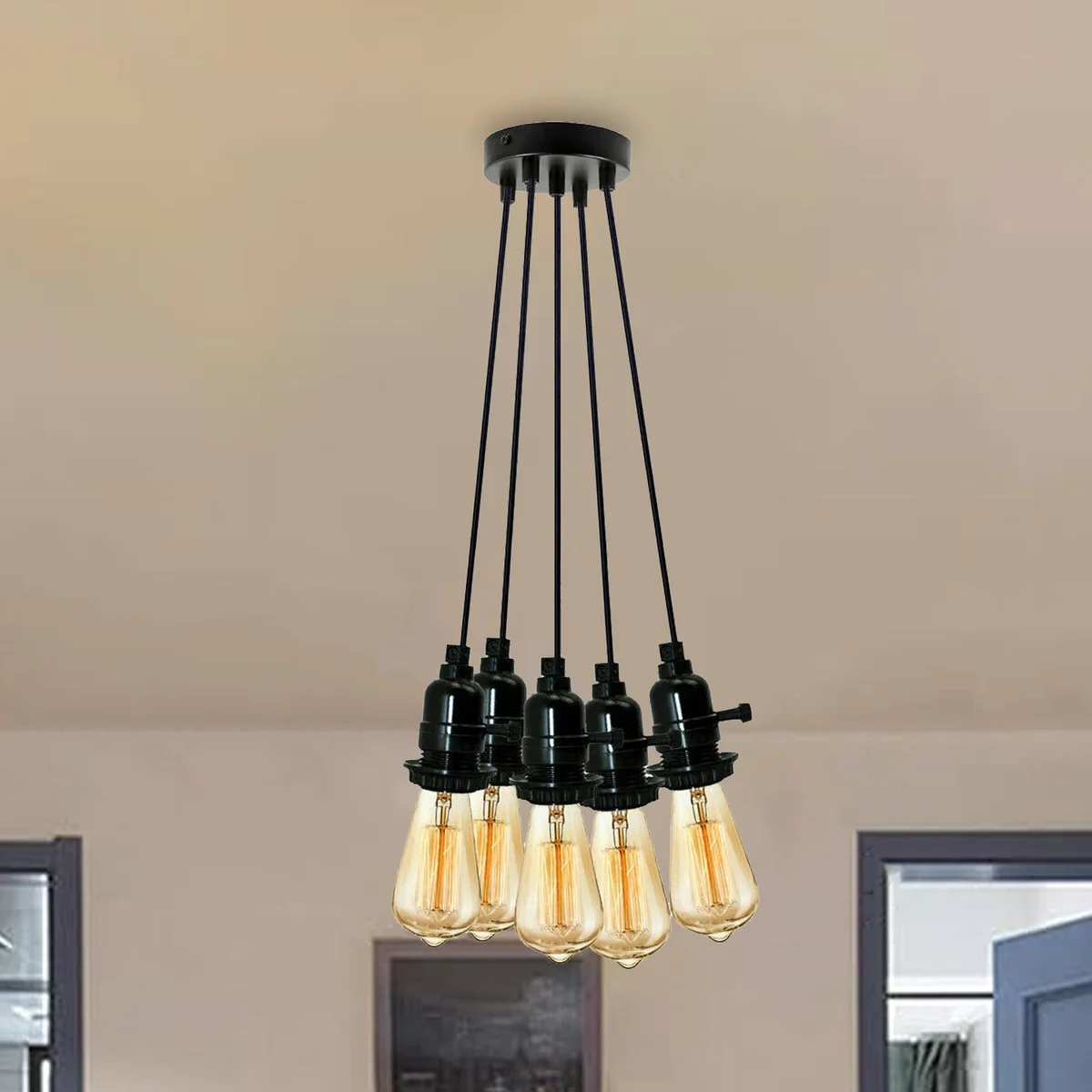 Modern matte black adjustable height pendant light with multiple cords and E27 bulb fittings in minimalist cluster design