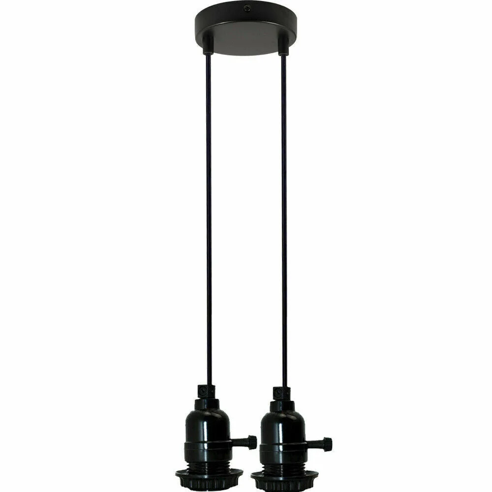 Modern cluster pendant light with matte black metal finish and adjustable cords hanging over a kitchen island