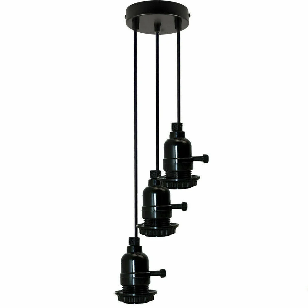 Modern cluster pendant light with matte black metal finish and adjustable cords hanging over a kitchen island