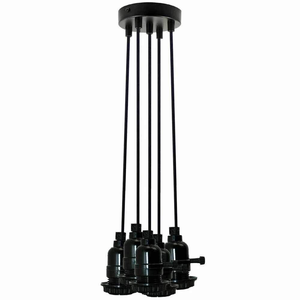 Modern cluster pendant light with matte black finish and adjustable cords hanging over a kitchen island setting