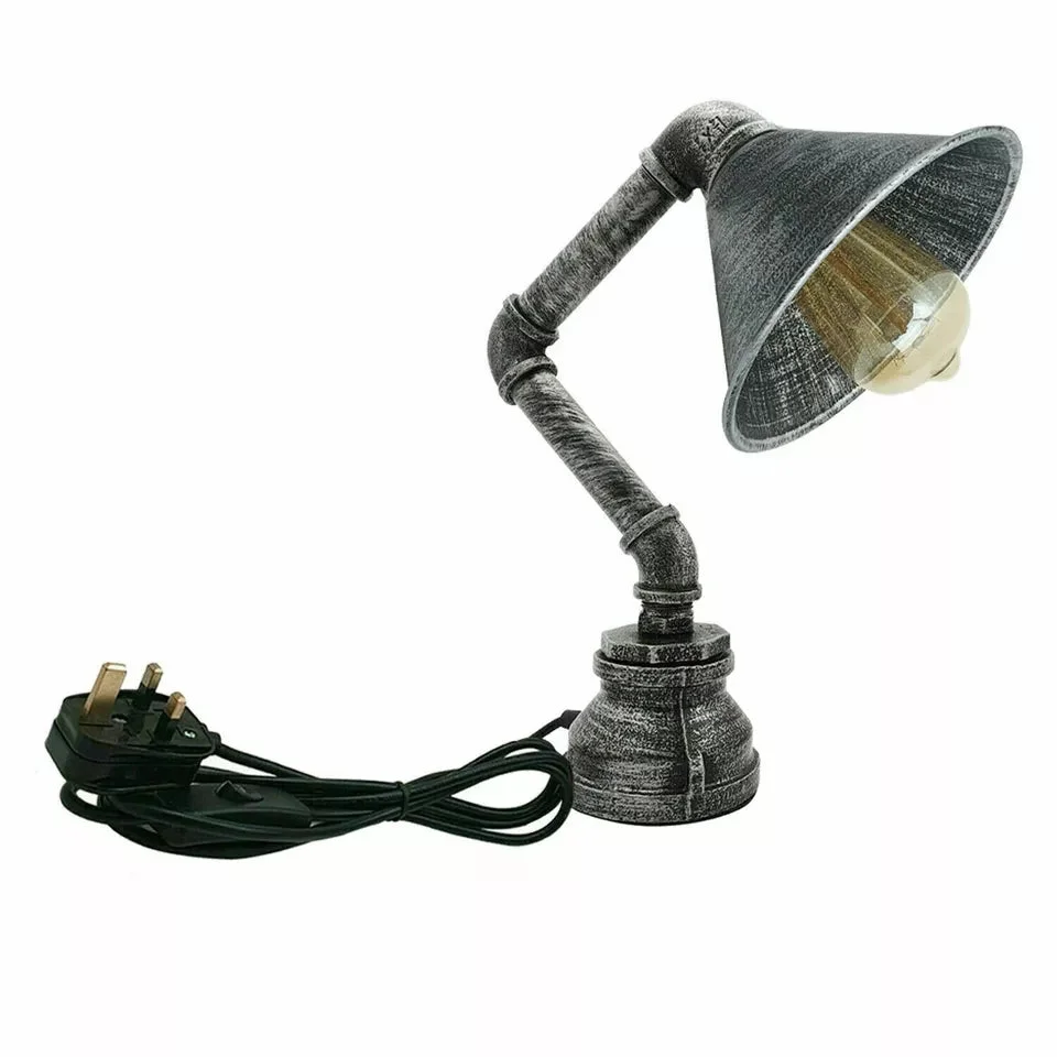 Steampunk table lamp with vintage water pipe design, metal cone shade, black finish, and in-line on/off switch