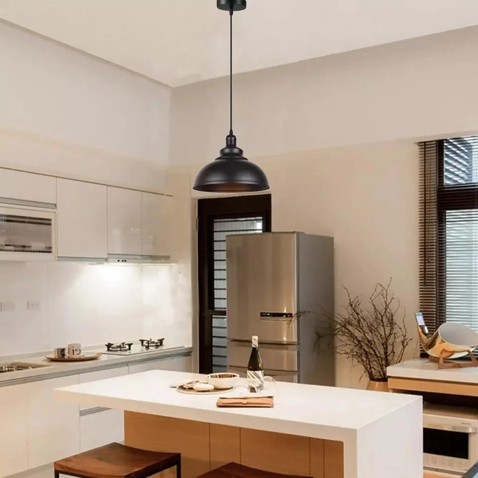 Three black metal dome industrial pendant light lampshades with holders, adjustable cords, shown in a set of three