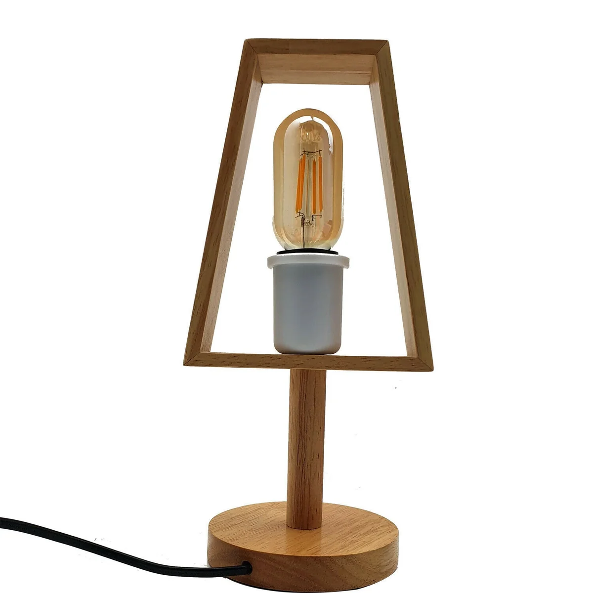 Black shade wood base lamp on a wooden table showing its plug-in cord and E27 bulb illuminated