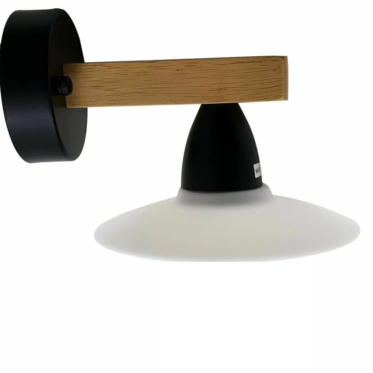 Set of three modern surface mount wall lights with filament bulbs, PVC shades, and natural wood accents on white wall