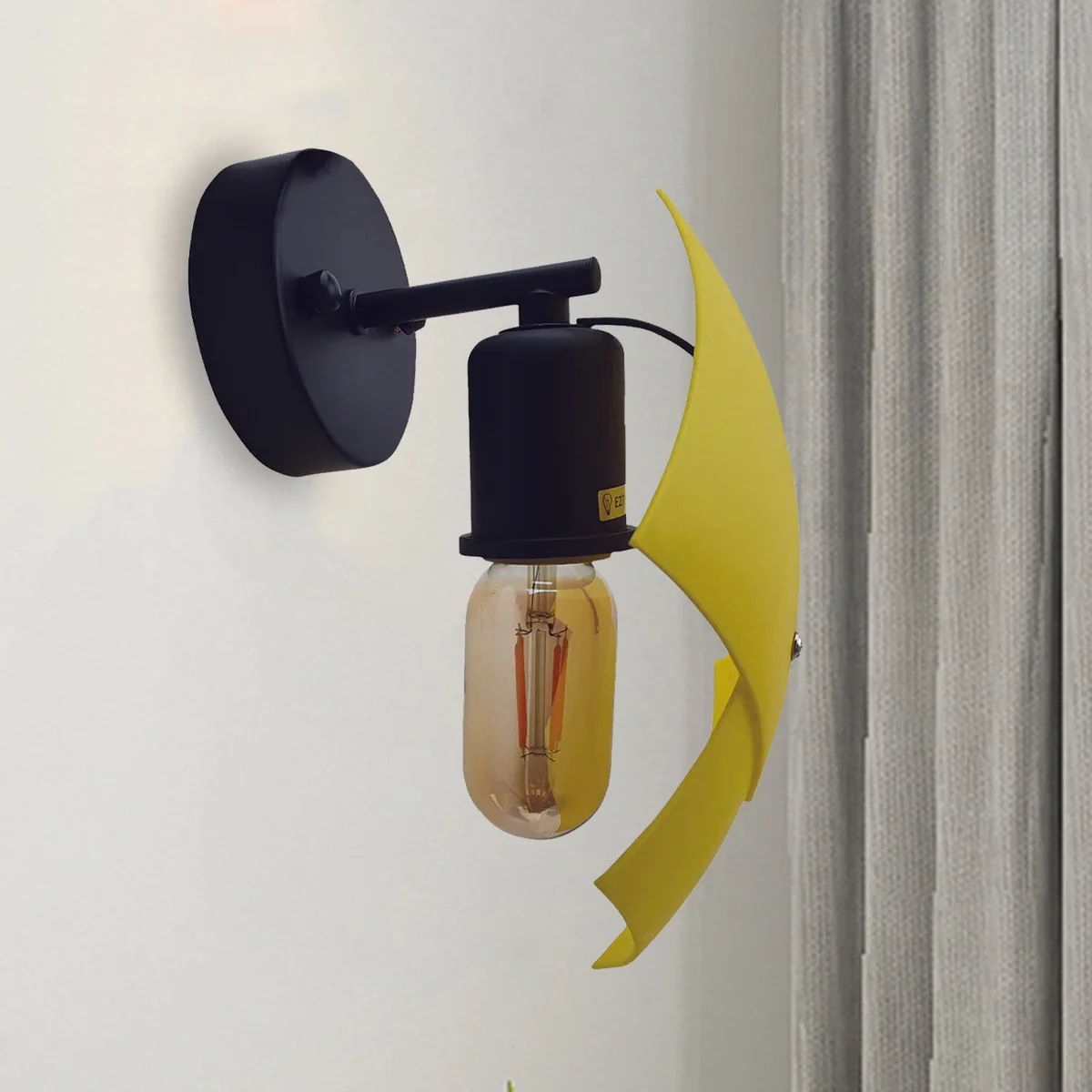 Three modern wall light indoor sconces with PVC shades and exposed metal hardware, each fitted with LED bulbs