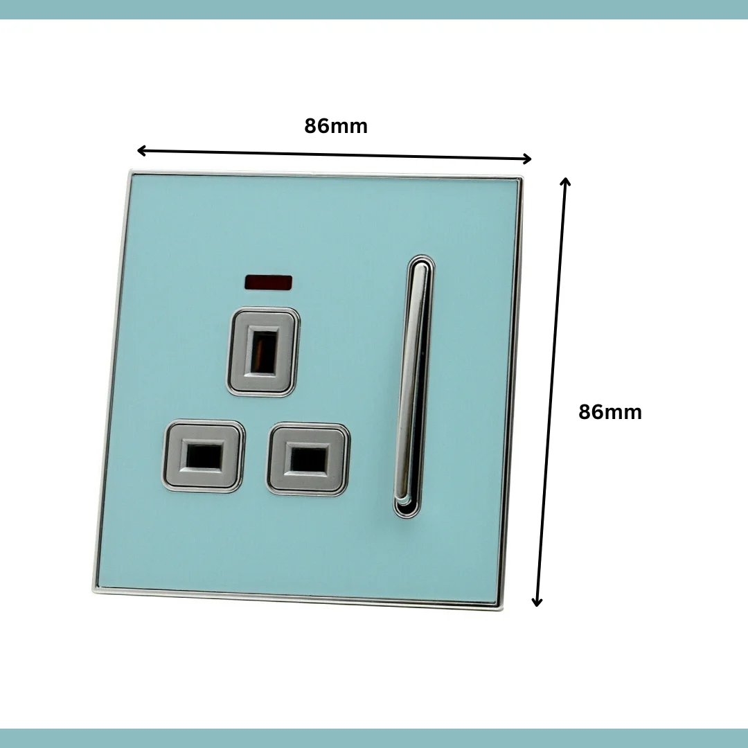 Blue glossy decorative wall socket with satin gold inserts and screwless fascia for a sleek UK 13A plug socket design