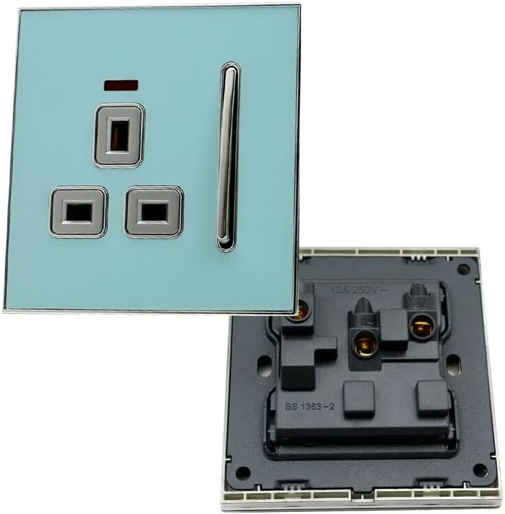 Blue glossy 13A UK plug socket with screwless fascia and satin gold socket insert on white background