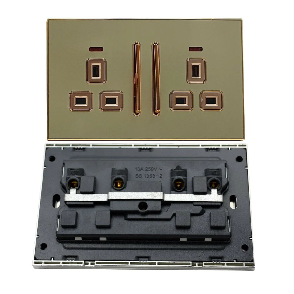 Close-up of decorative satin gold socket insert with glossy gold main plug socket and screwless design