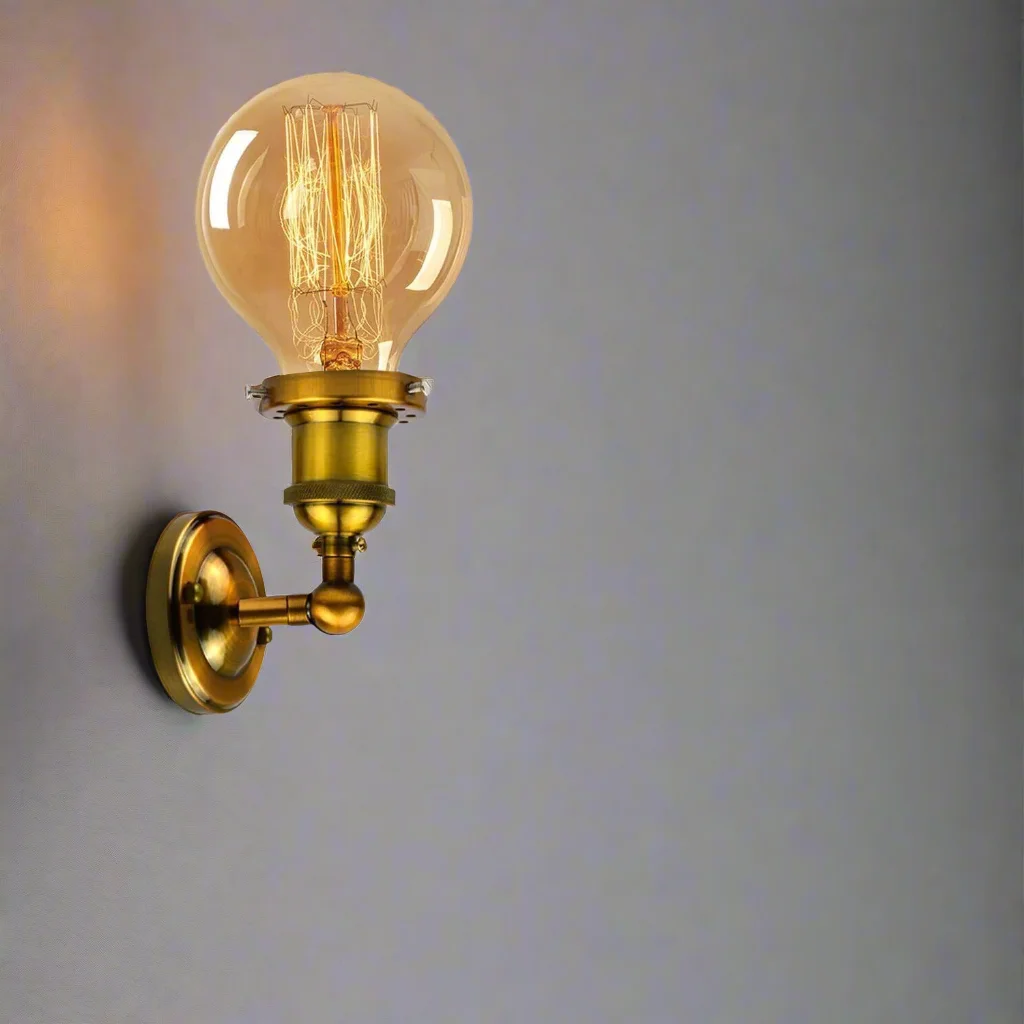Vintage industrial wall sconce with yellow brass finish, round ceiling rose, and E27 Edison lamp holder on metal arm