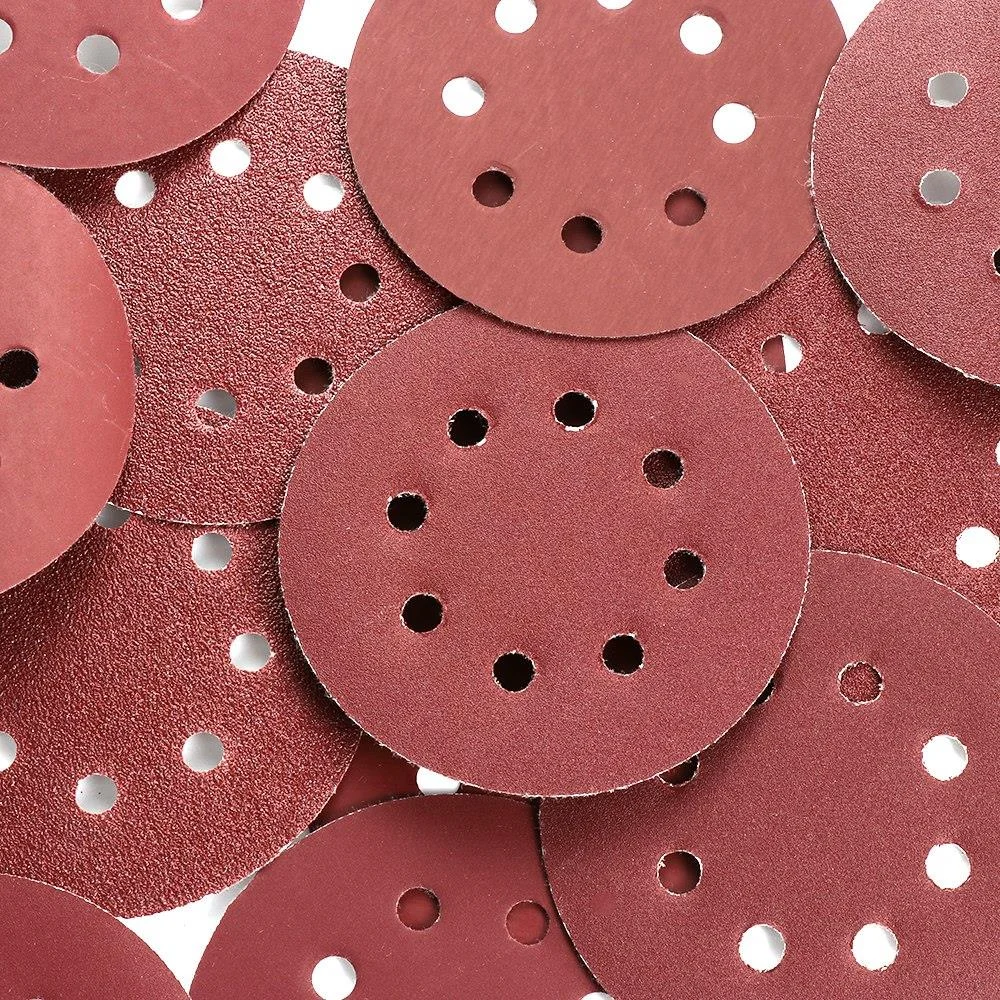 Set of five red 5 inch sanding discs with 8 holes, made from aluminum oxide for metal and wood sanding tasks