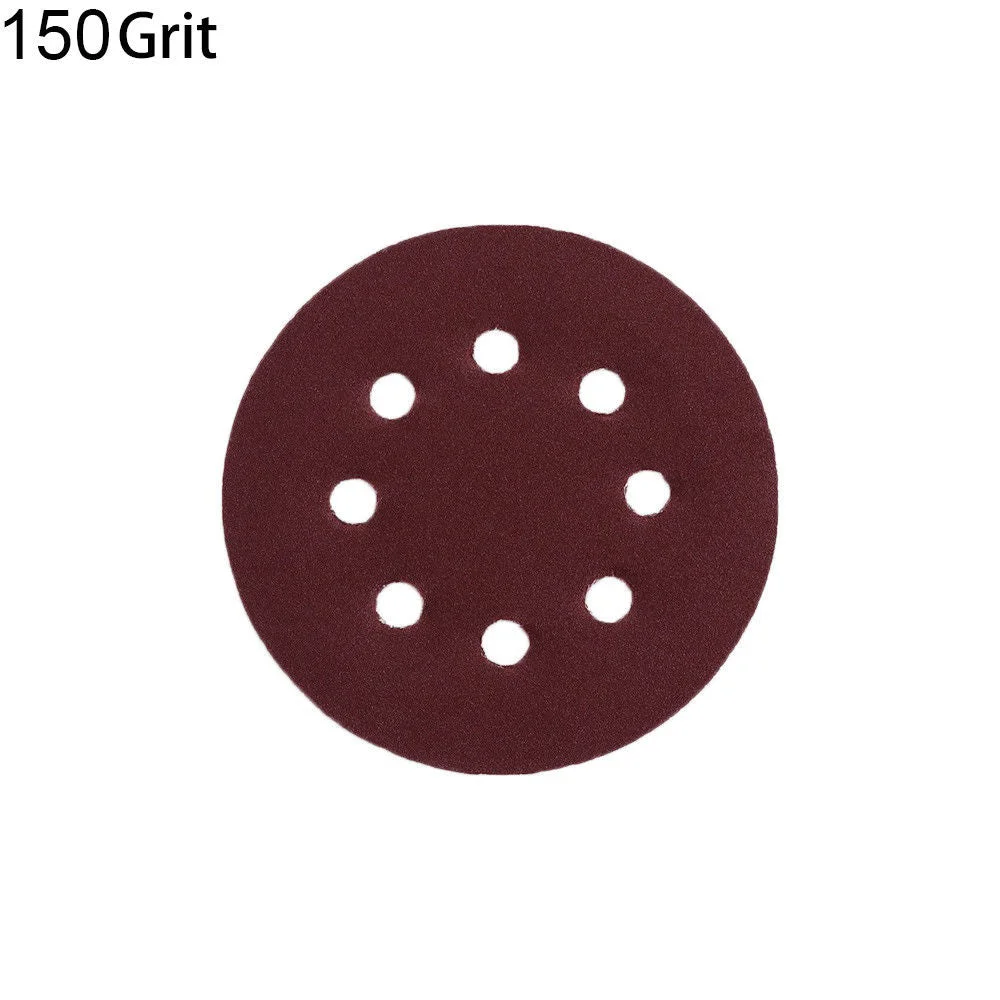 Set of five 5 inch 150 grit sanding discs with 8 dust extraction holes, reddish brown color, hook and loop backing