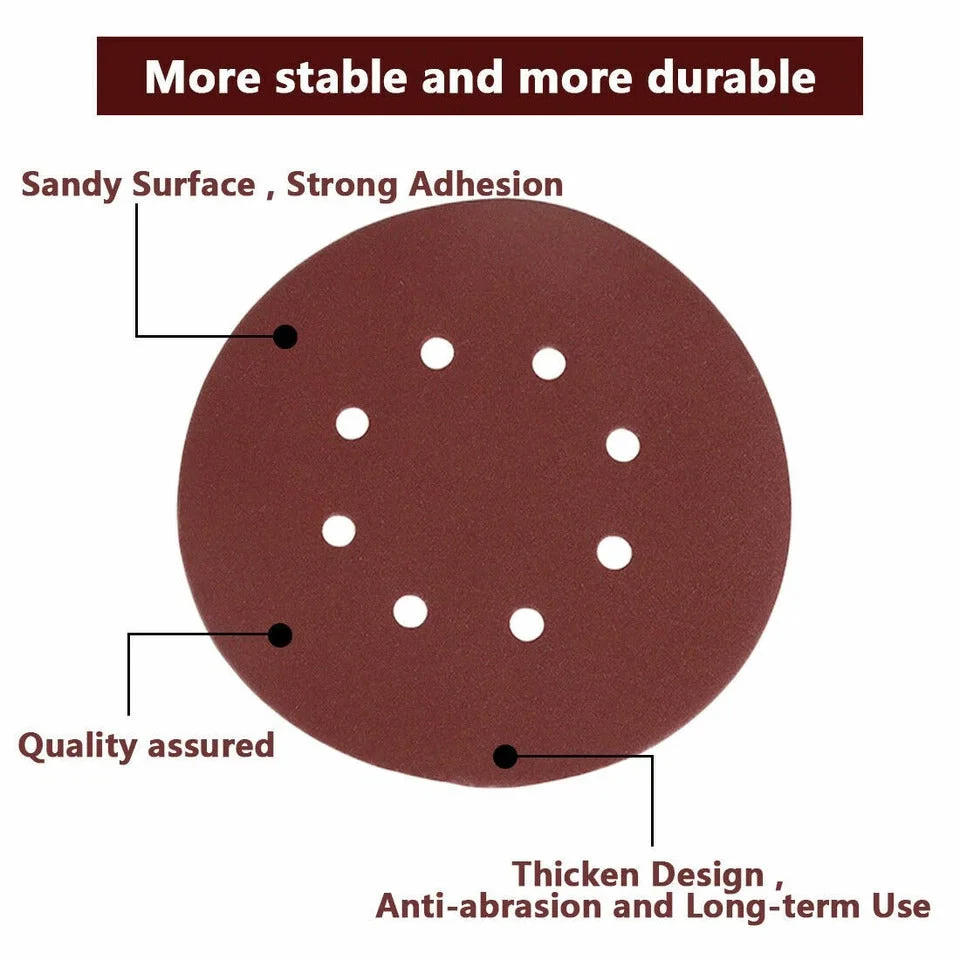 Stack of reddish brown 5 inch sanding discs with 8 holes and hook and loop backing for dust extraction and easy attachment