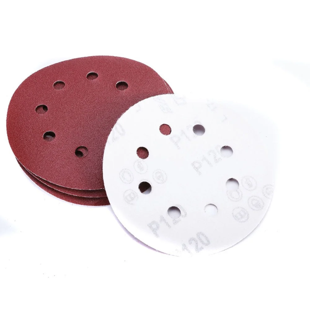 Set of reddish brown 125mm 8 hole sanding discs with 60 grit, showing hook and loop backing for orbital sanders