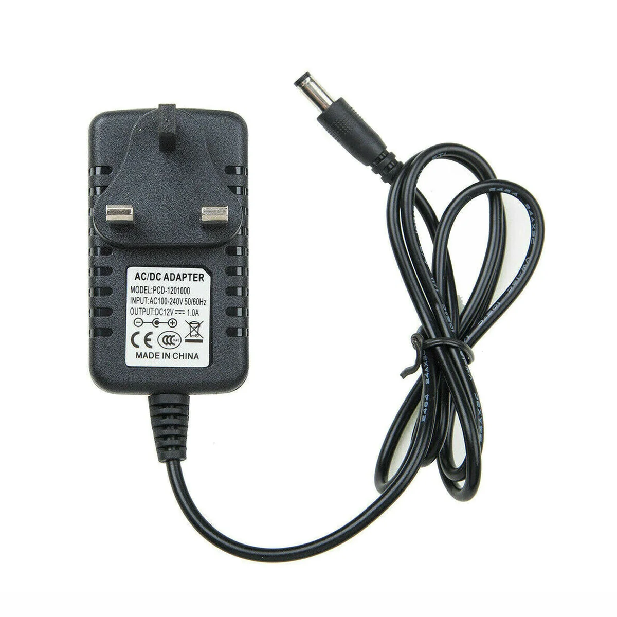 12V power adapter UK with UK plug, plastic shell, 5.5mm x 2.5mm output jack, and 90cm cable length