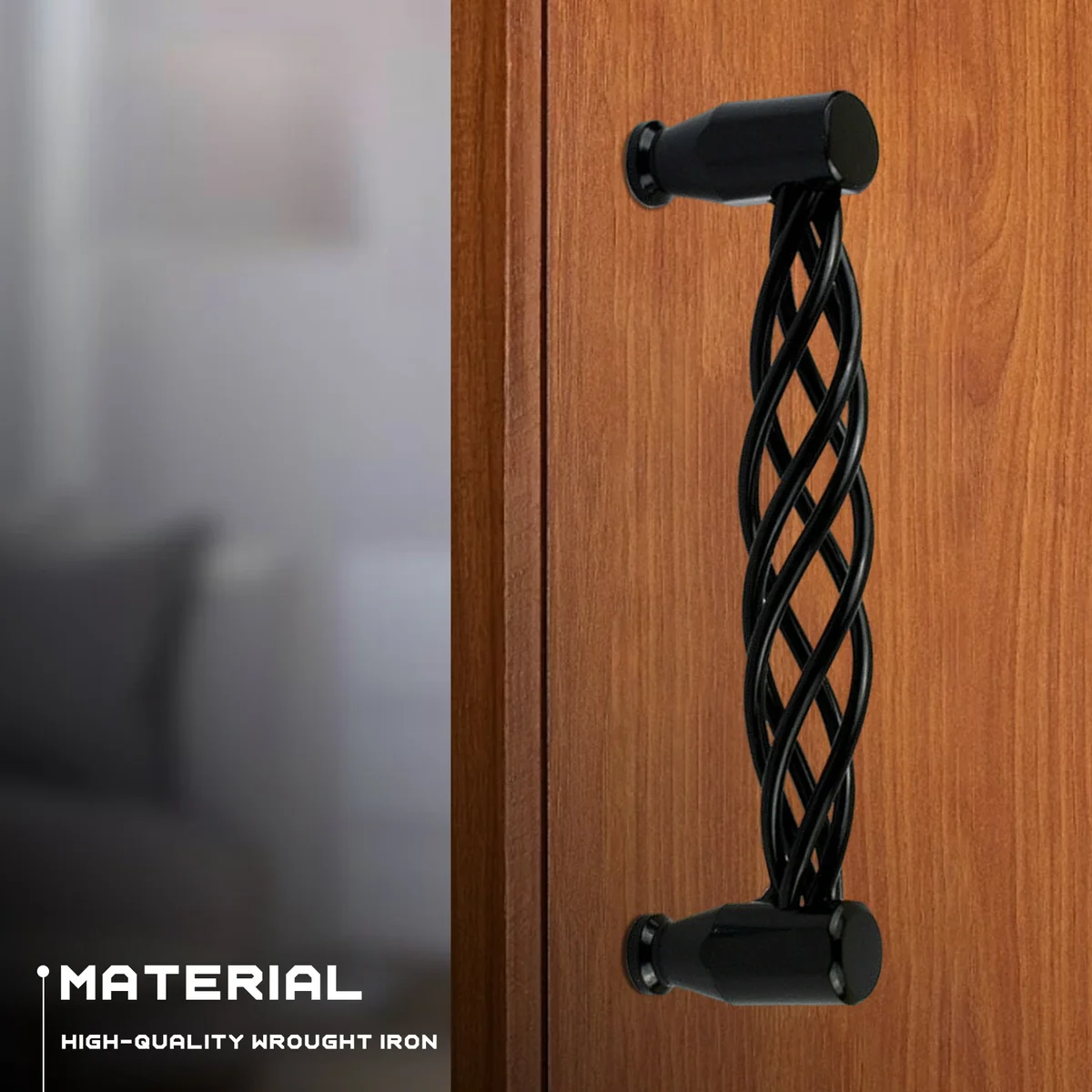 Matt black 128mm drawer handles mounted on wooden cabinet doors with visible installation hardware kit nearby