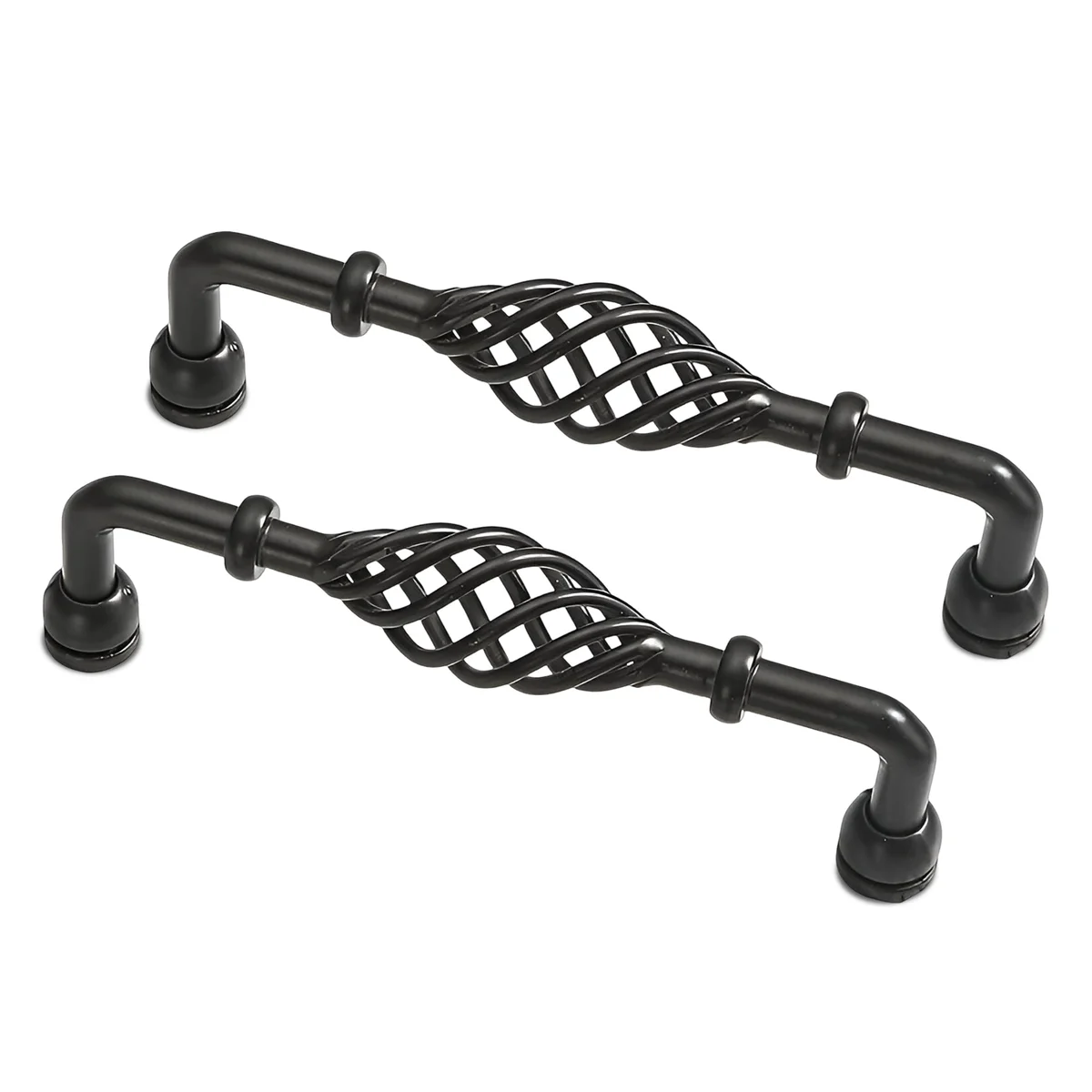 Vintage kitchen cabinet handle in black metal shaped like a birdcage, shown installed on wooden cupboard door