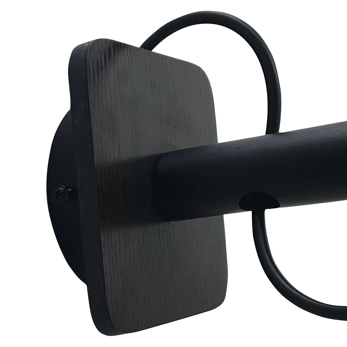 Modern industrial black surface mount wall light with white ceramic shade and exposed hardware on wooden base
