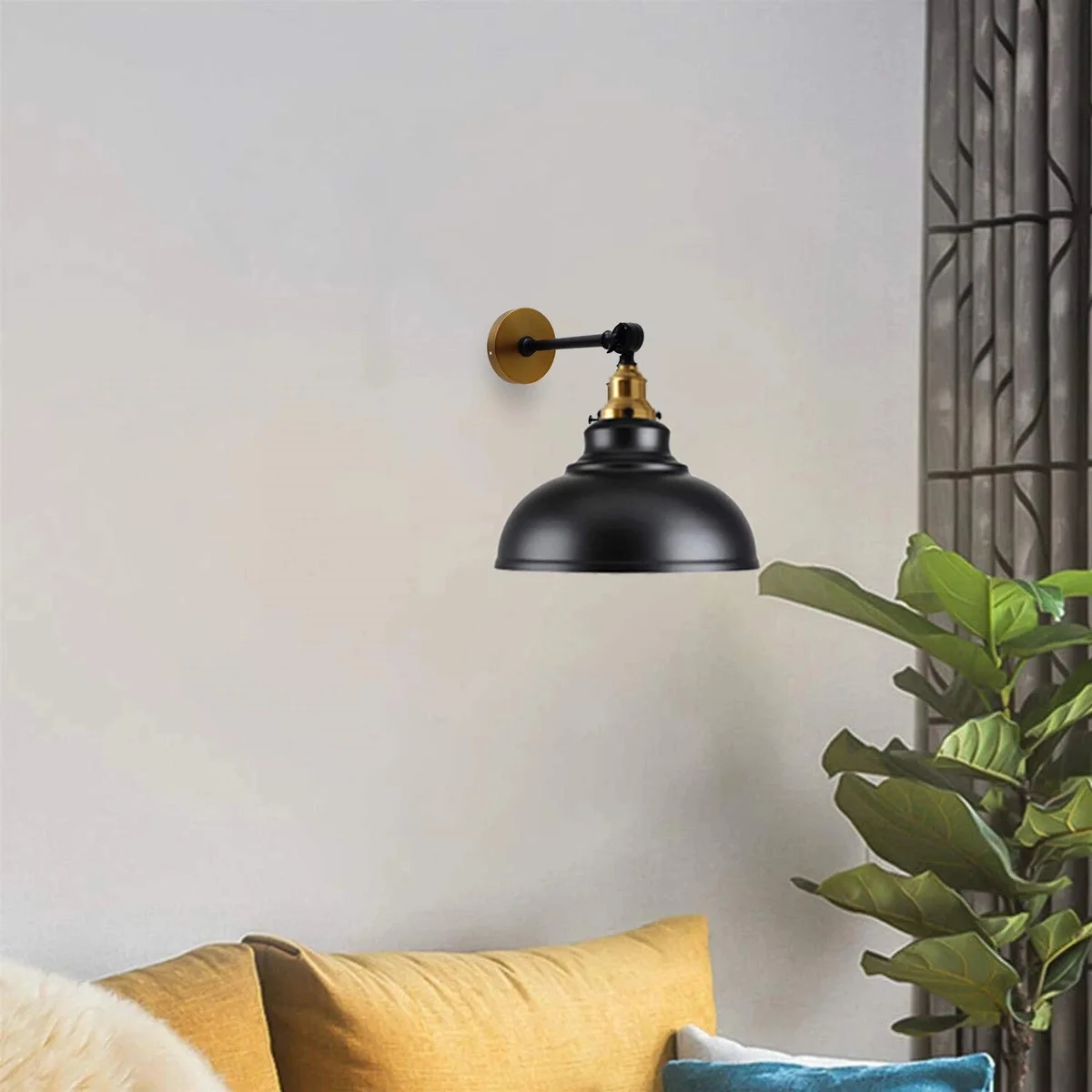Industrial wall mounted light with a curvy metal shade light in glossy finish, styled for retro industrial interiors