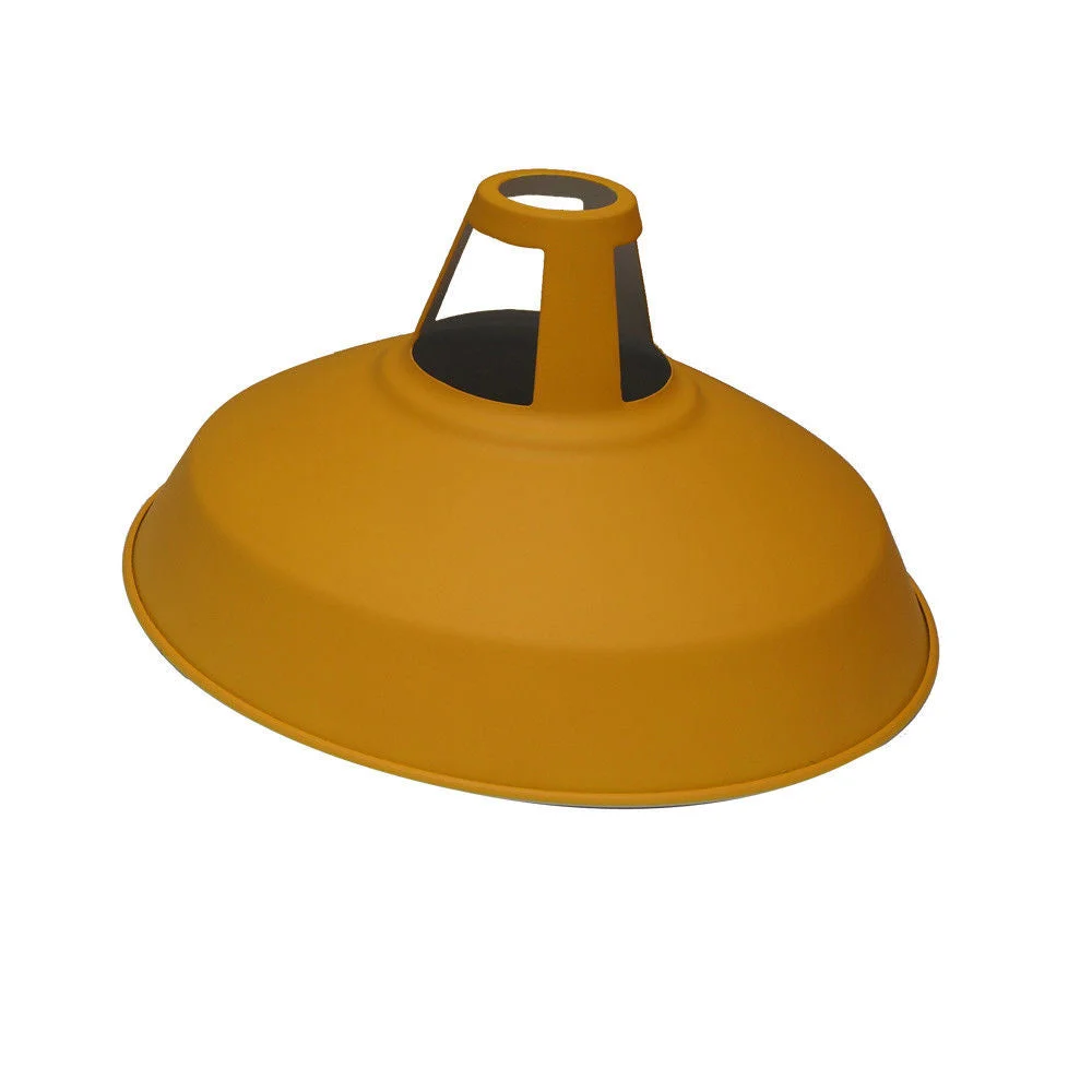 Yellow pendant light with vintage industrial metal lampshade and black fabric-covered cable hanging from ceiling
