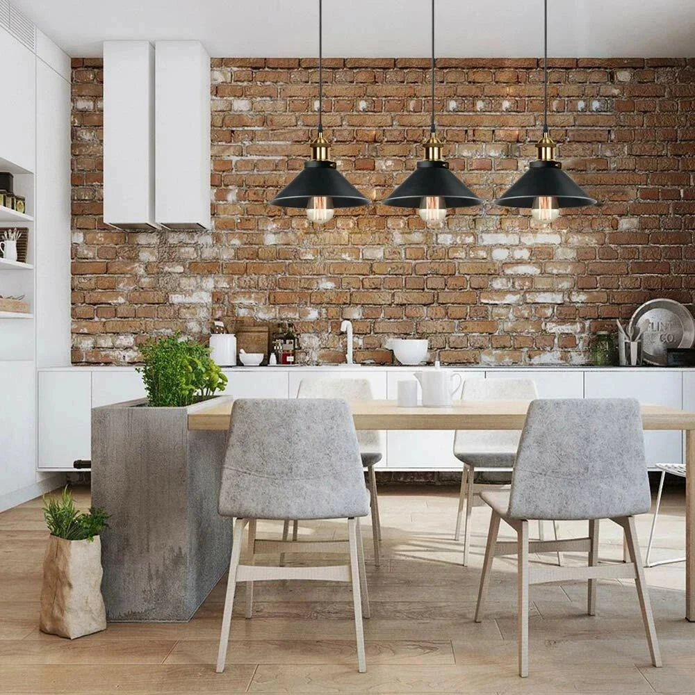 Adjustable 3-way metal pendant light in white and black with twisted cables and three light holders hanging from ceiling plate