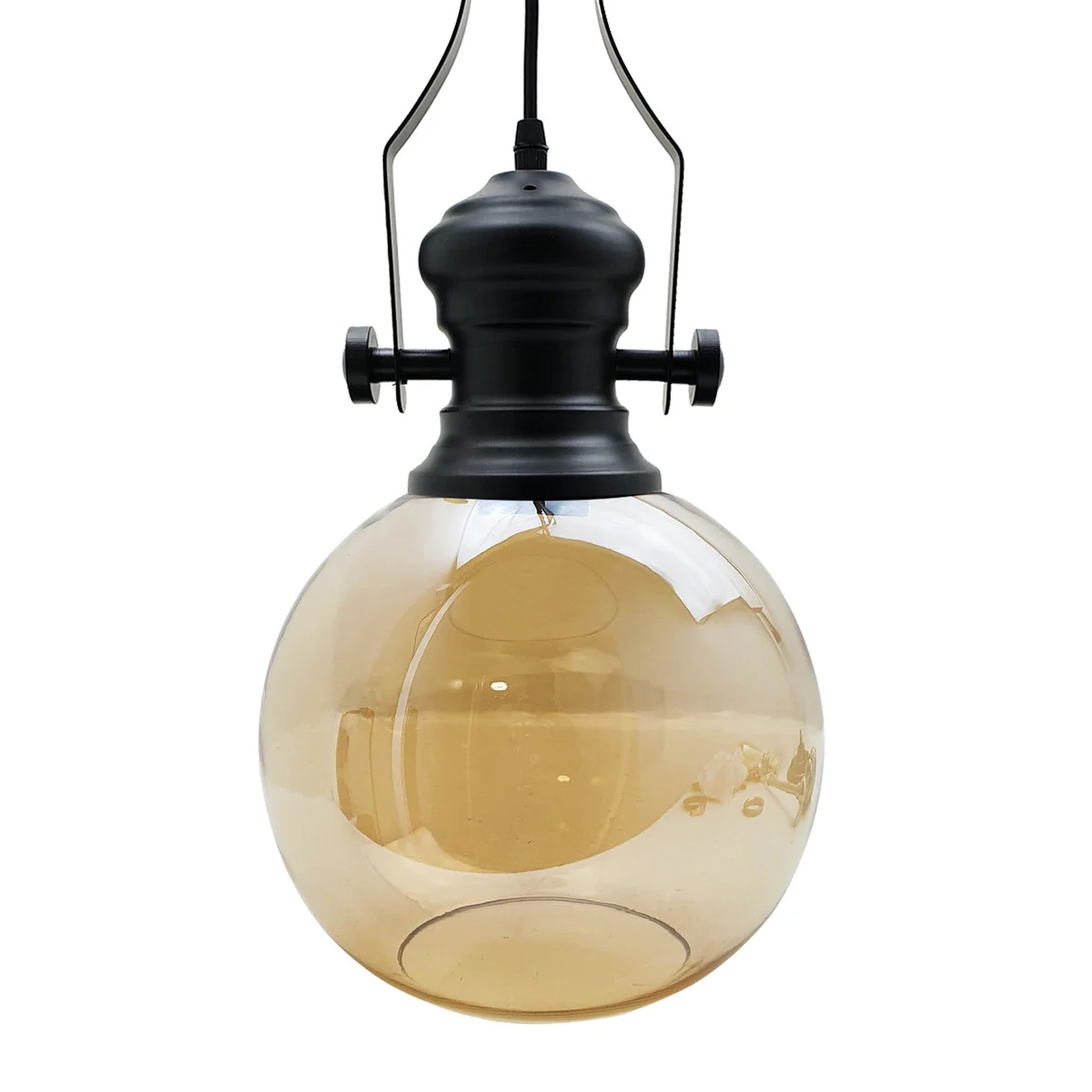 Amber glass pendant lamp with industrial-style black metal cage and round ceiling canopy suspended by chain and cable