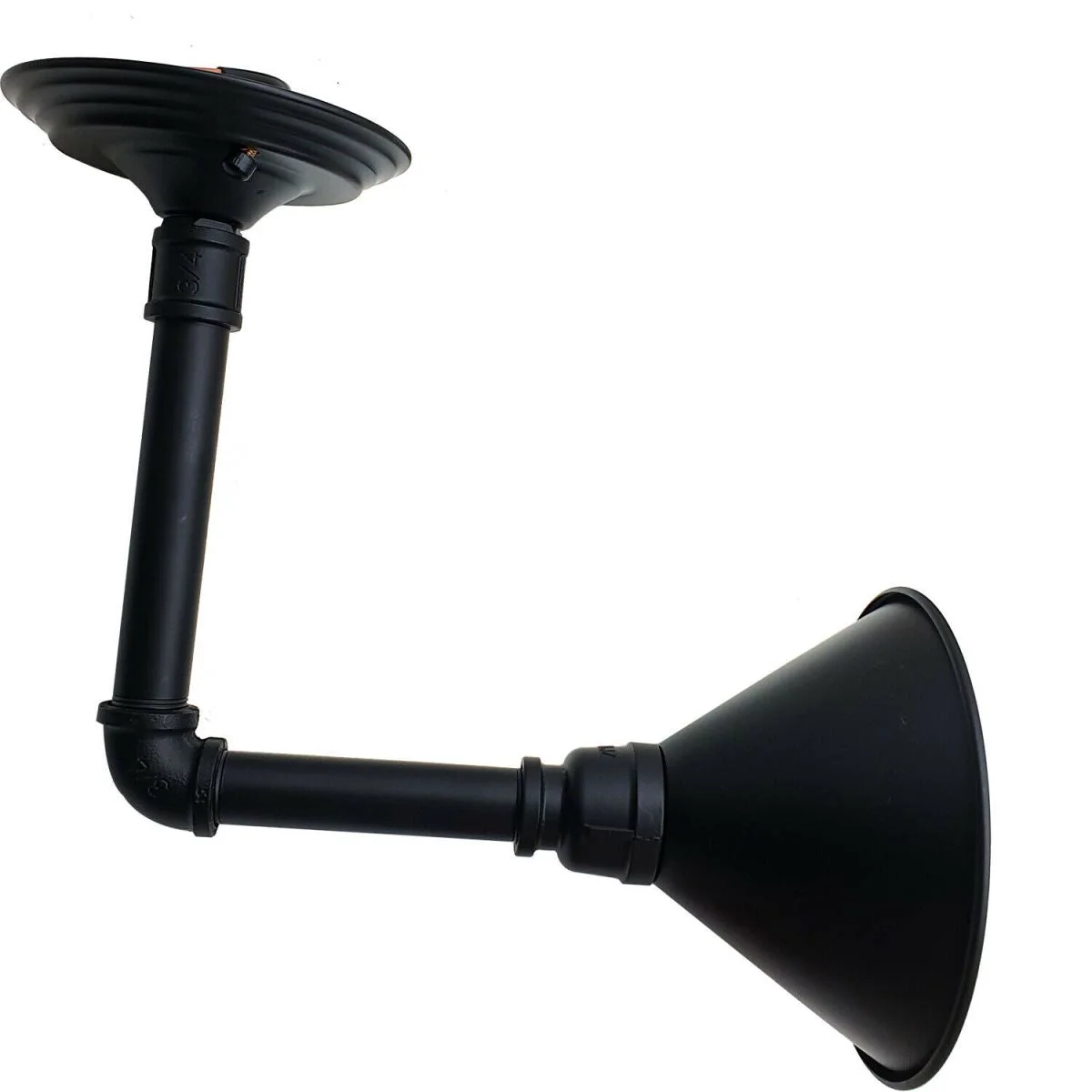 Black steampunk wall light with industrial pipe design, metal fixture and shade, mounted on wall.