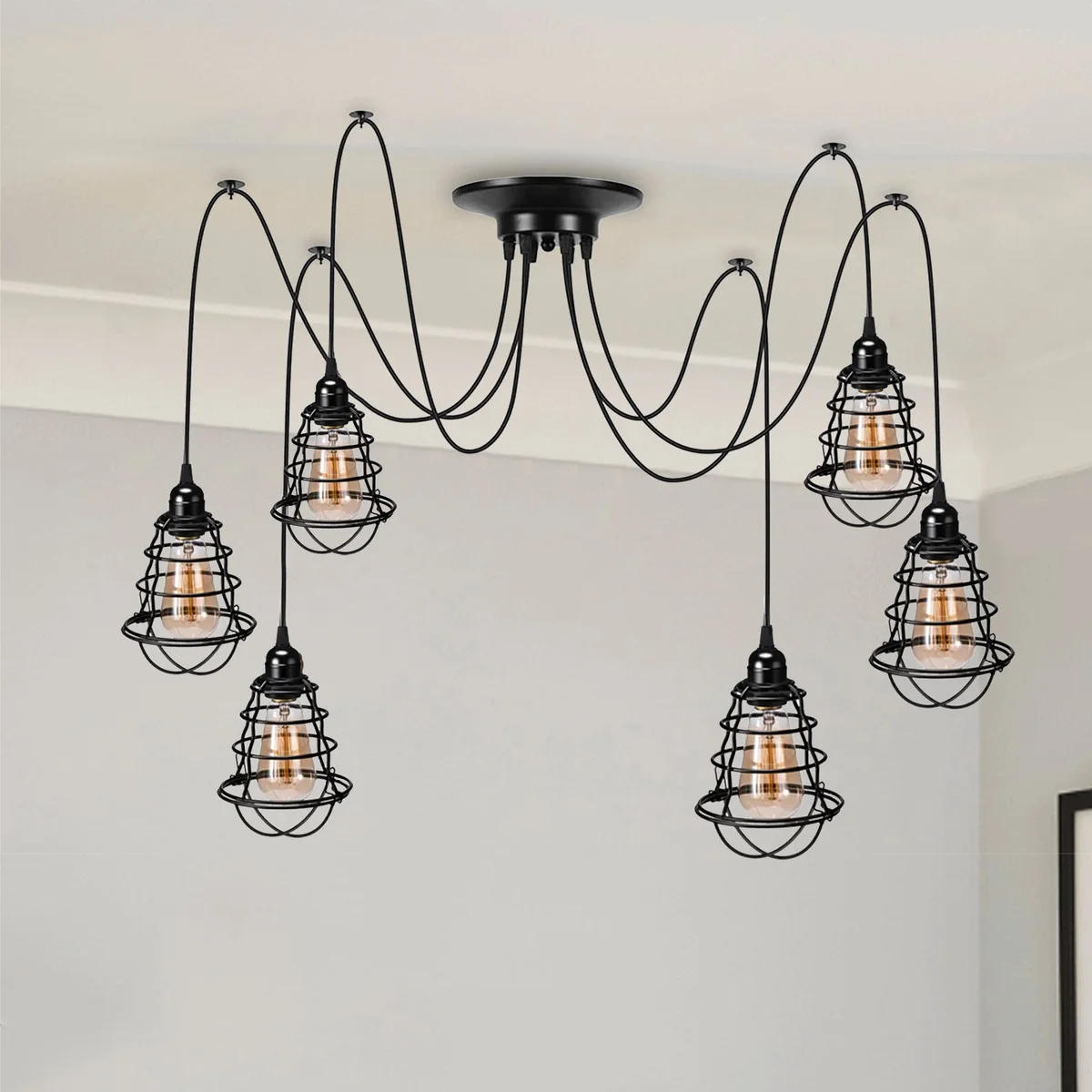 6‑way black industrial spider pendant light with mixed wavy and mug cages, iron finish, adjustable 2m cables.