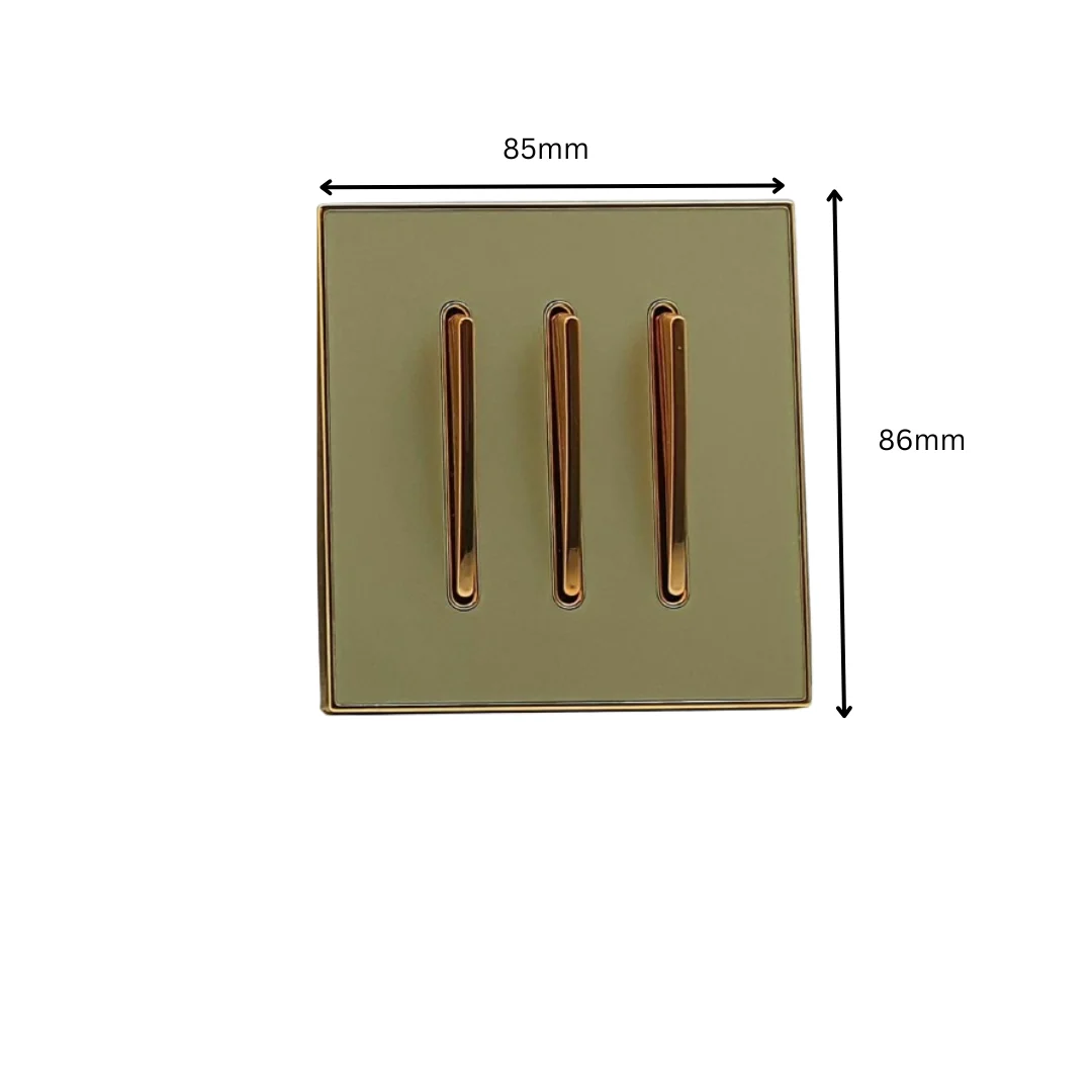 Antique brass 3‑gang 2‑way light switch, BS5733 approved, with stamped logo on metal body.