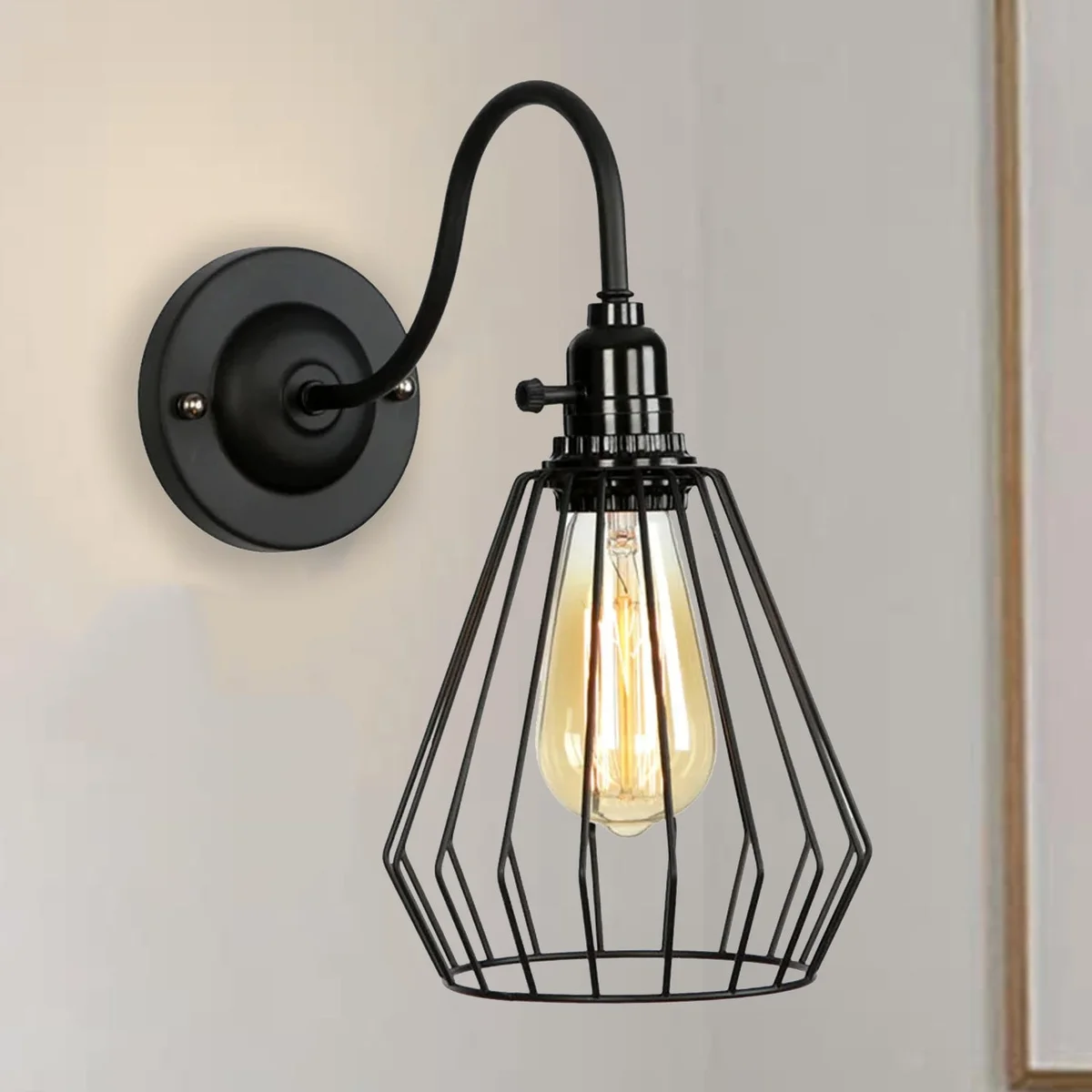 Industrial style black iron cage wall light with E27 holder and light arm, no bulb included.
