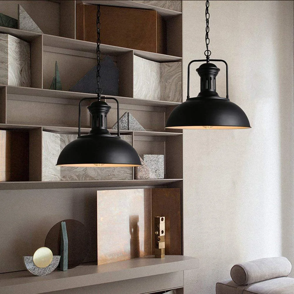 Vintage ceiling pendant with antique metal barn design, black shade, adjustable chain, hung from a ceiling rose.
