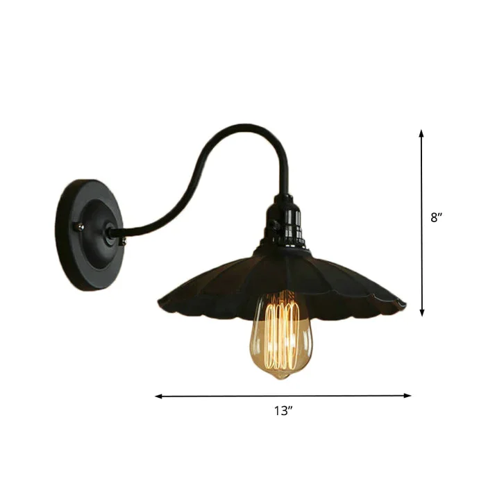 Black iron cage rustic wall sconce with metal shade, mounted on wall, includes E27 holder, delivered without bulb.
