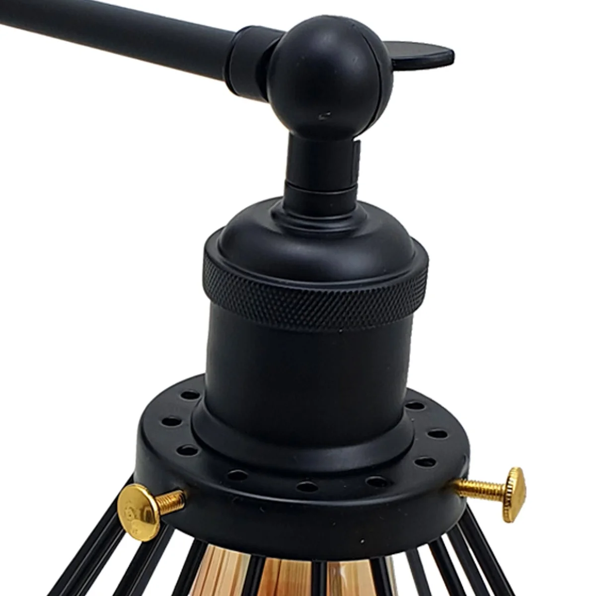Adjustable wall lamp with black metal wire cage shade on wall