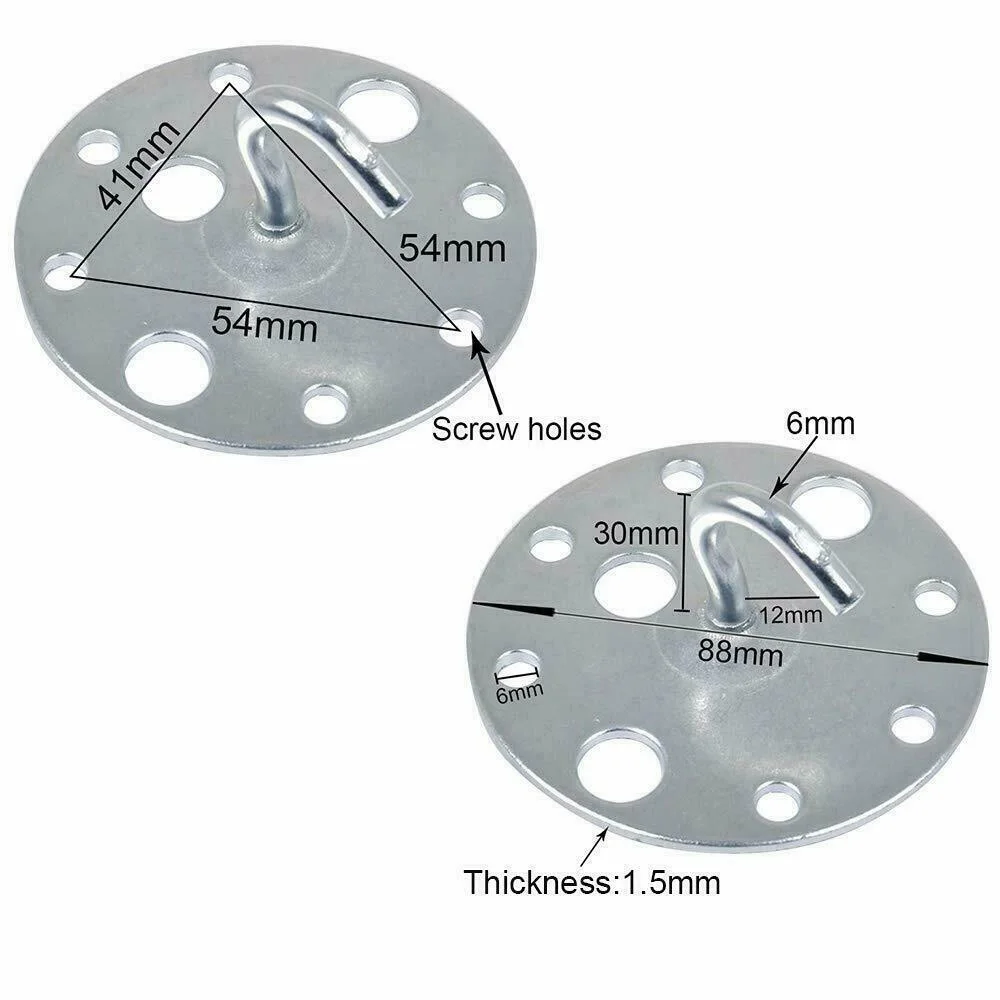 Stainless steel ceiling hook with U‑shaped design and wide circular base, shown on a test surface.