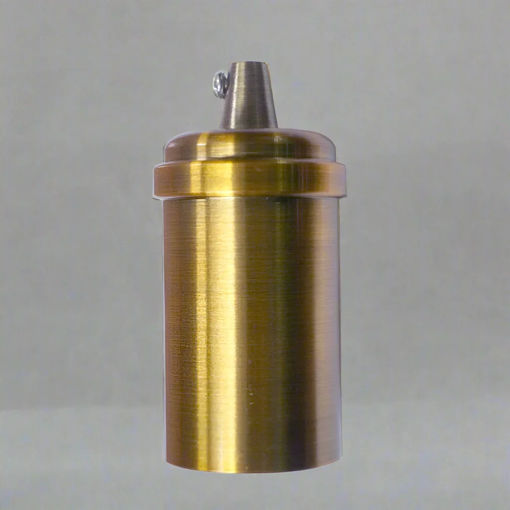 Rose gold metal E27 bulb holder on a simple stand, showing the round metal base for a vintage bulb