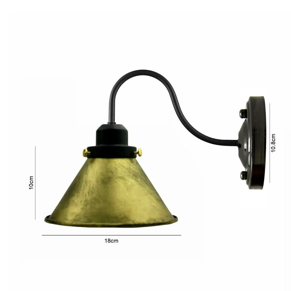 Brushed brass metal wall sconces resting on iron frame, pendant style with dark accents suitable for loft interiors.