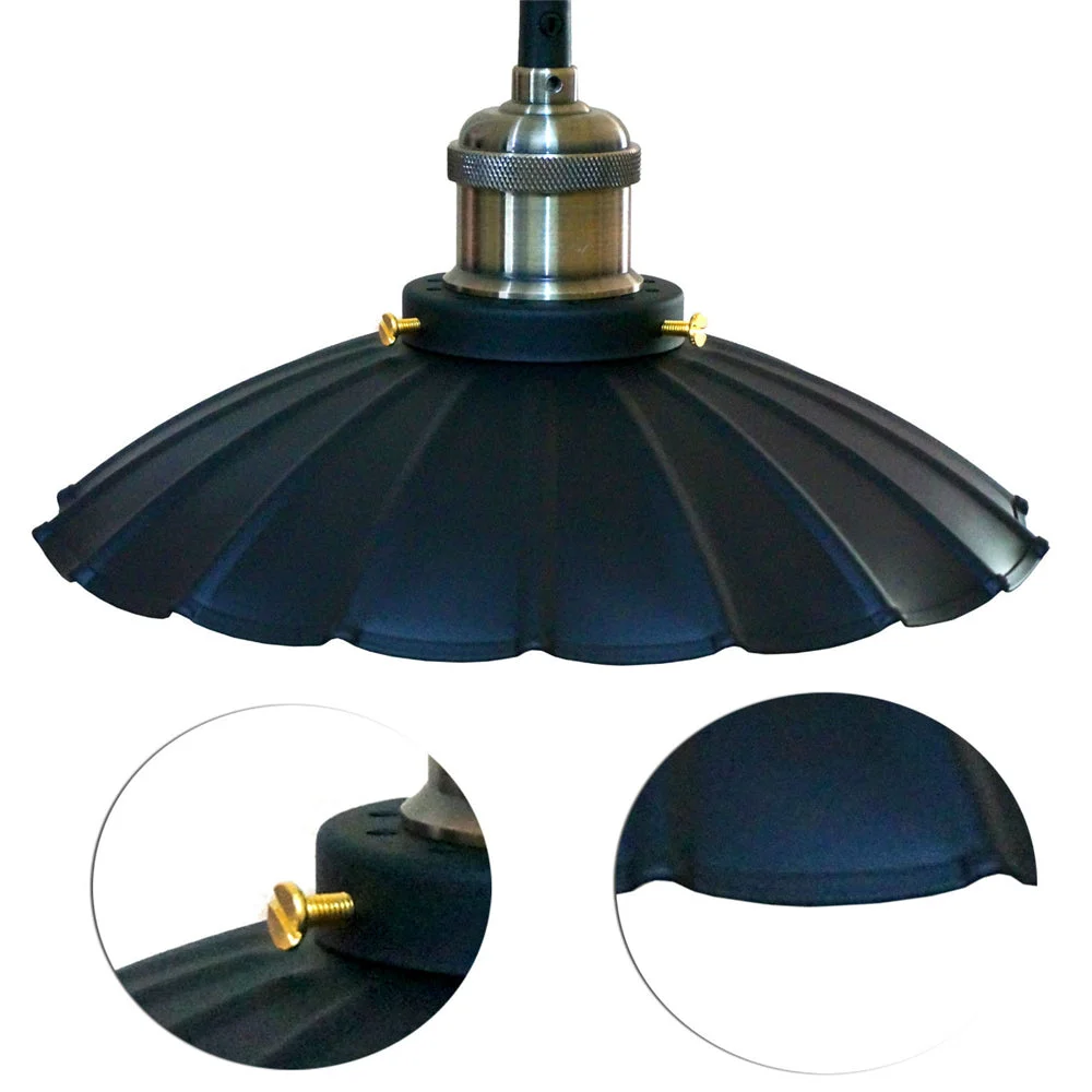 Black pendant light featuring a wavy metal shade, round 25 cm canopy, black fabric cable 100 cm long.