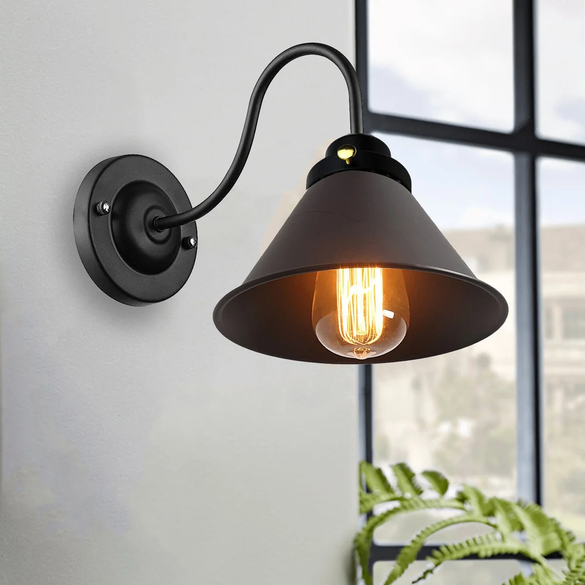 Modern wall light on wall, 18cm iron shade, E27 holder, 24cm arm.