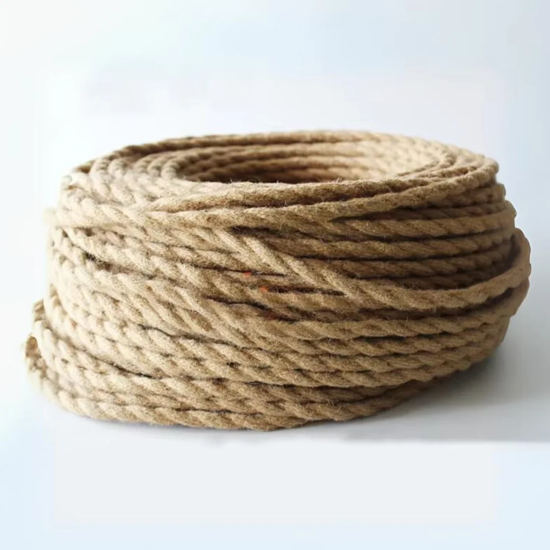3 core twisted cable braided in hemp fabric, 6 mm diameter, shown coiled, suitable for indoor lighting.