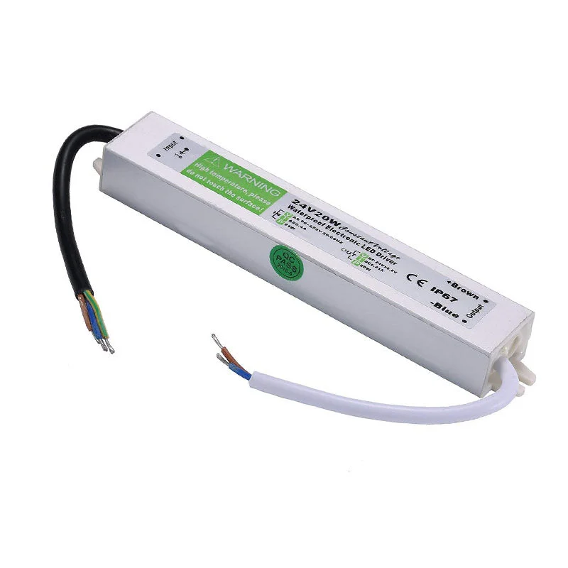 Aluminum alloy LED driver transformer with rubber‑sealed cable, 24 V output, 20 W, IP67 waterproof, for outdoor LED lighting.
