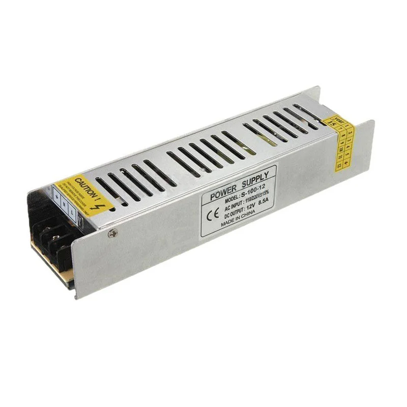 Compact 100W universal LED transformer with 12V DC output, labeled for indoor use, safe cooling fan, IP20 enclosure.