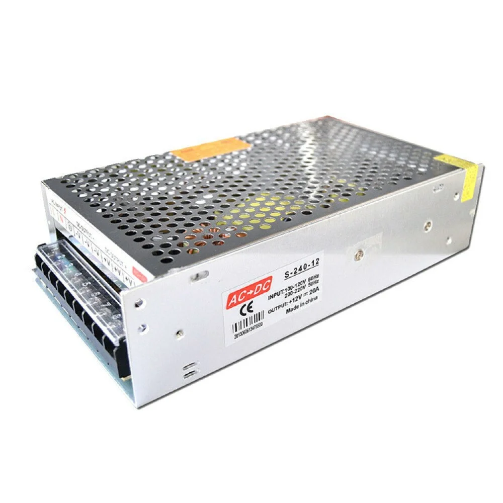Compact 12V LED transformer in metal housing with cable attachment and labeled output specifications.